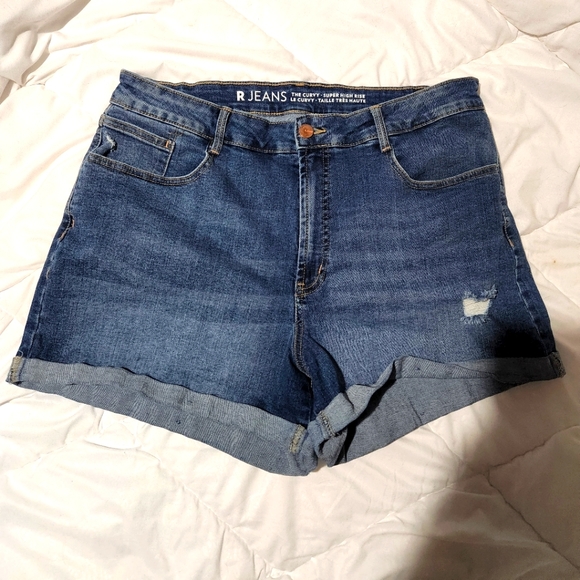 Blue denim distressed jean shorts. Size 34. - Picture 1 of 8